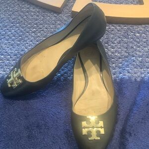 Used pair of Tory Burch black flat heel shoe
